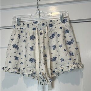 Threads of Luxx Blue Floral Women's Shorts with ruffled edge size medium.